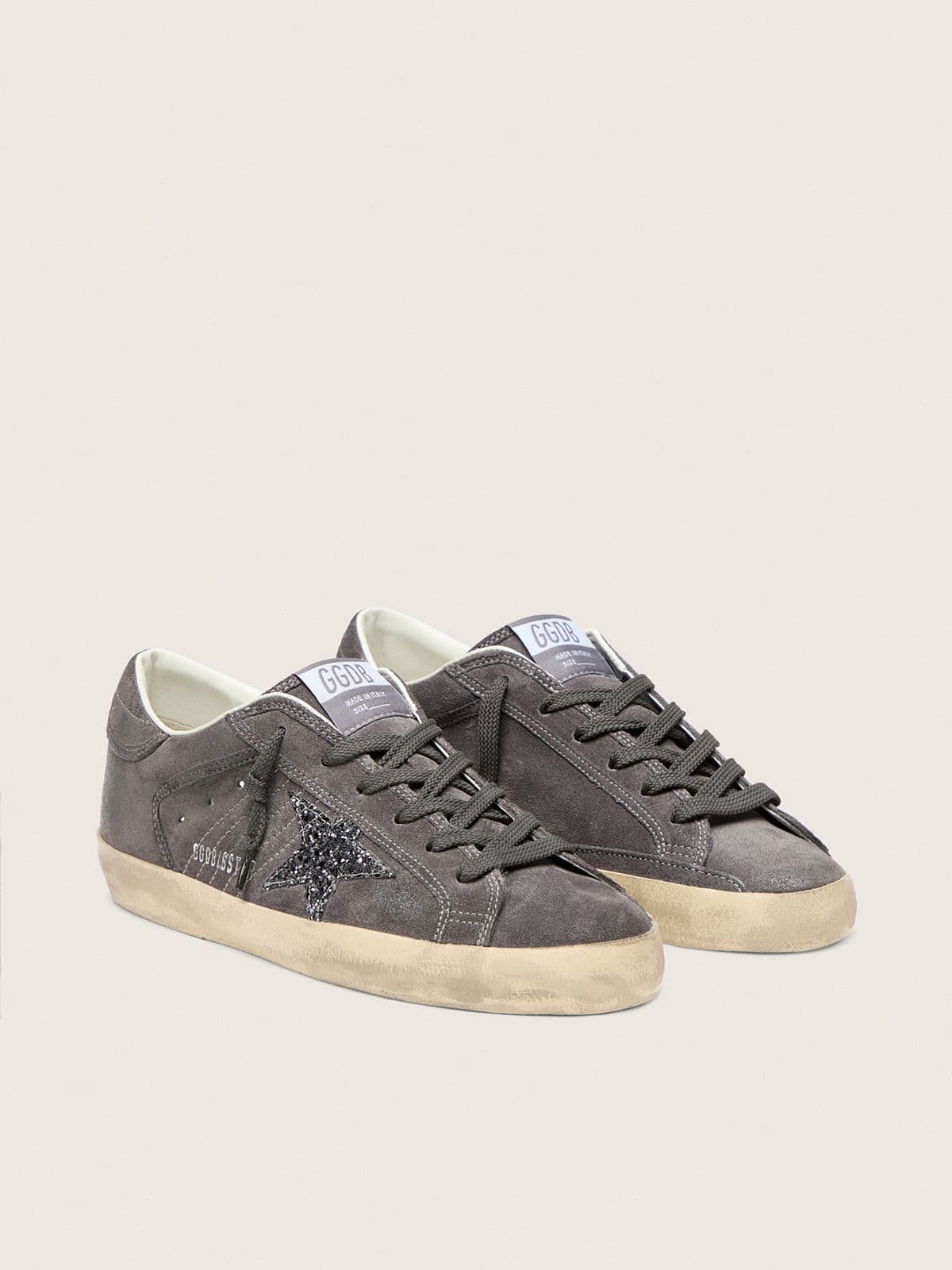 Women’s Super-Star in grey suede with a glitter star