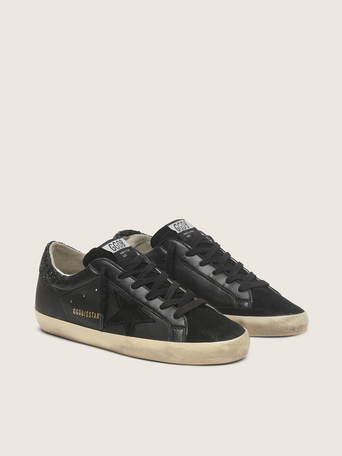 Women’s Super-Star in black nappa with black star and glitter heel tab