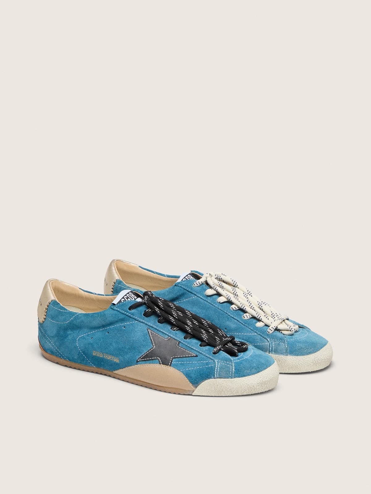 Women's True-Star in teal suede with black star and cream heel tab