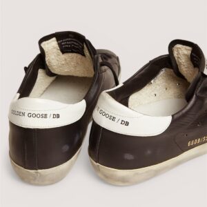 Women’s Super Star in black leather with white leather star and heel tab
